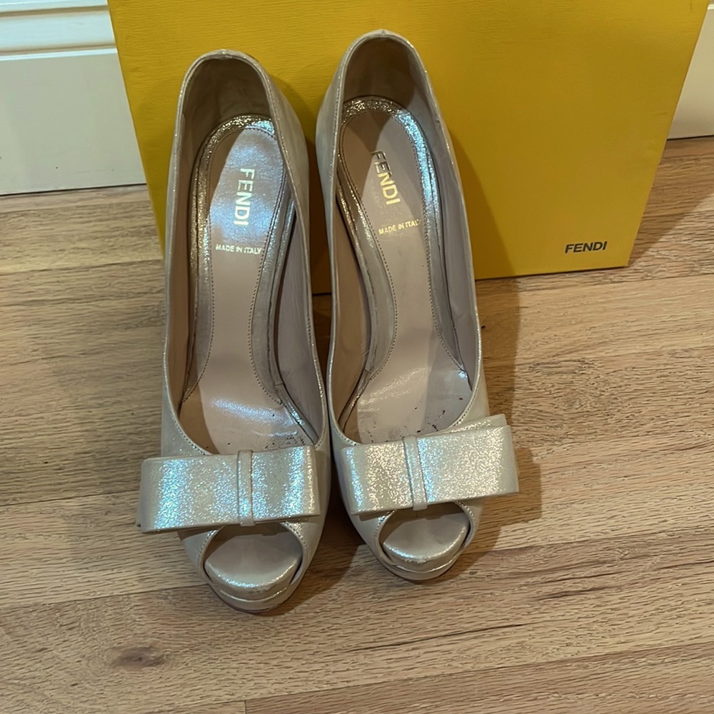 Fendi! 100% authentic Platinum Silver suede color
